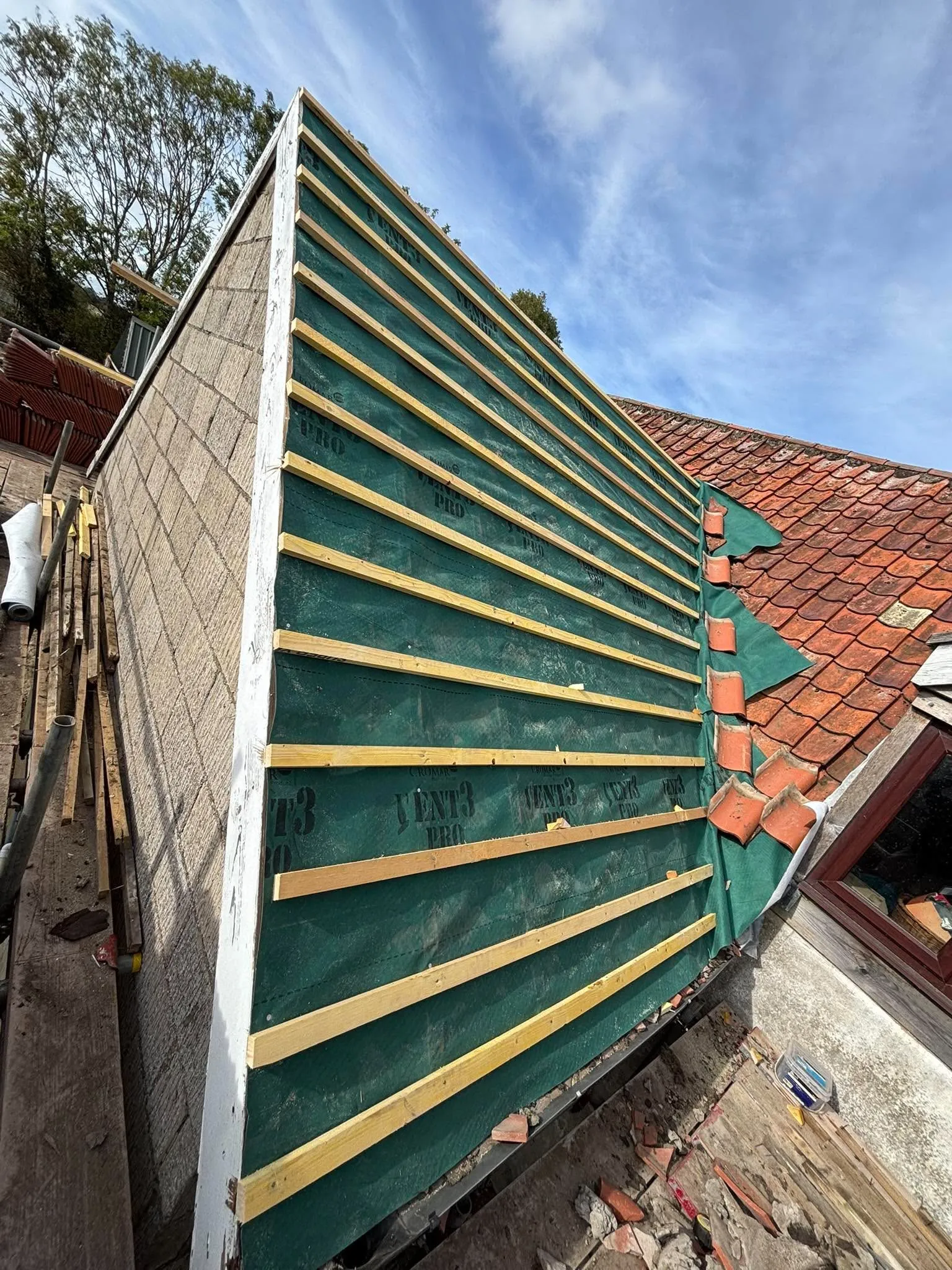 New breathable membrane and battens fitted ready for tiling
